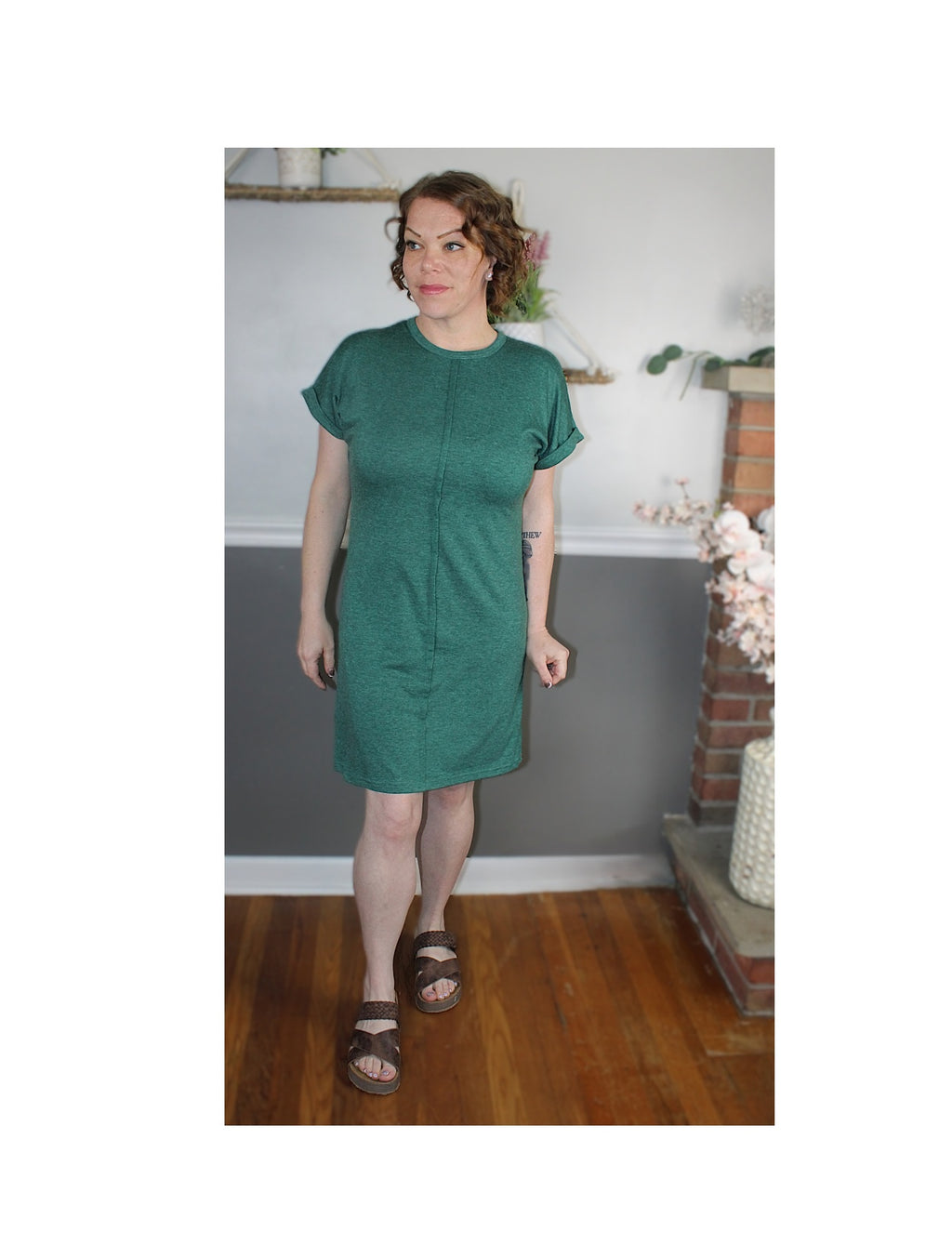 Green t-shirt dress with exposed hem line 